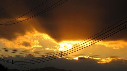 輝く夕日の三つ巴