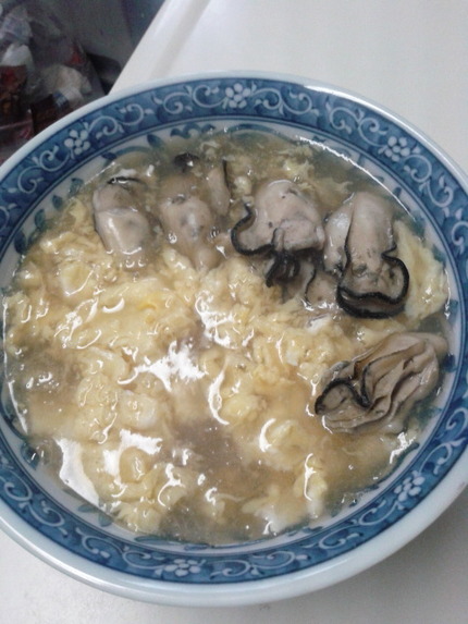 昼は牡蠣玉うどん