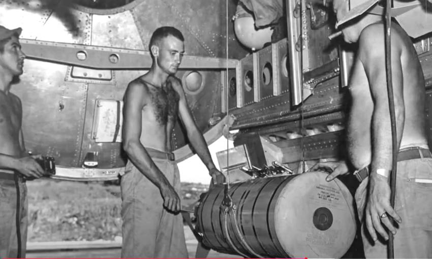 A B29 munitions crew winches...