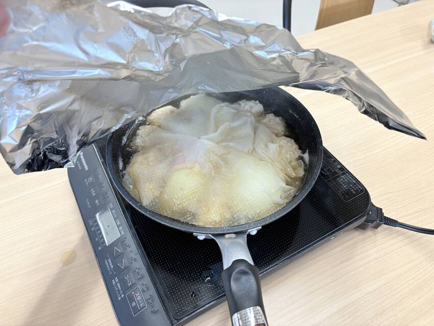 メインディッシュを煮込む。 新...